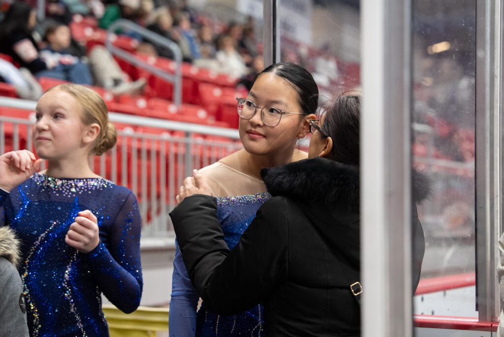 A group of athletes competing in athletic event sports