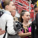 A group of athletes competing in athletic event sports