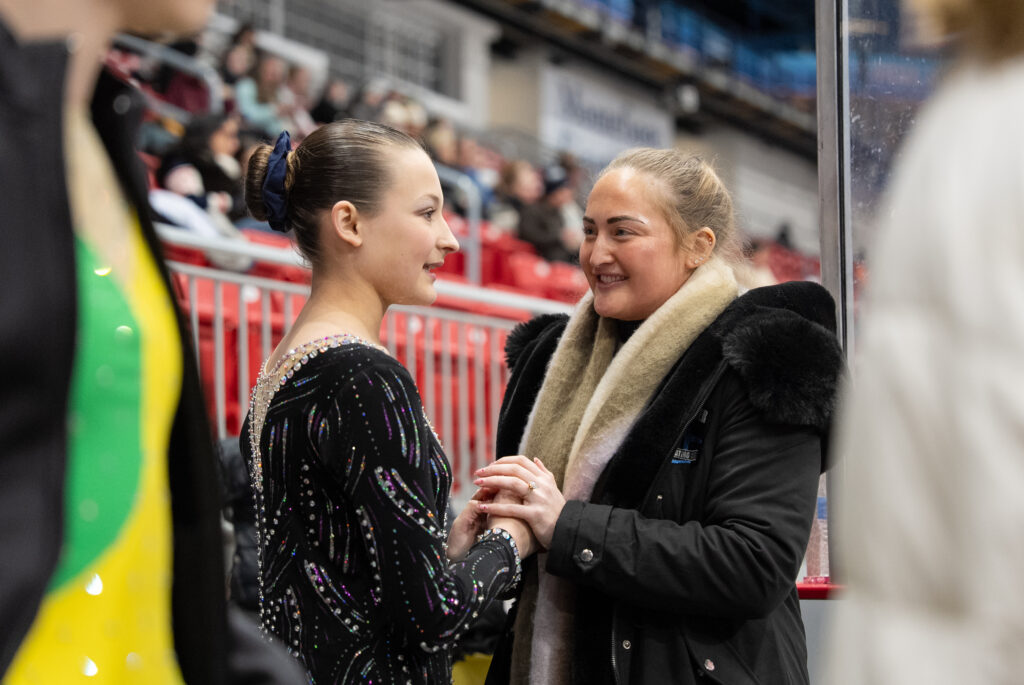 A group of athletes competing in athletic event sports