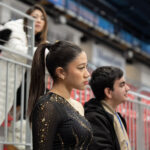 A group of athletes competing in athletic event sports