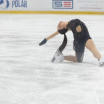 An athlete skating on the rink