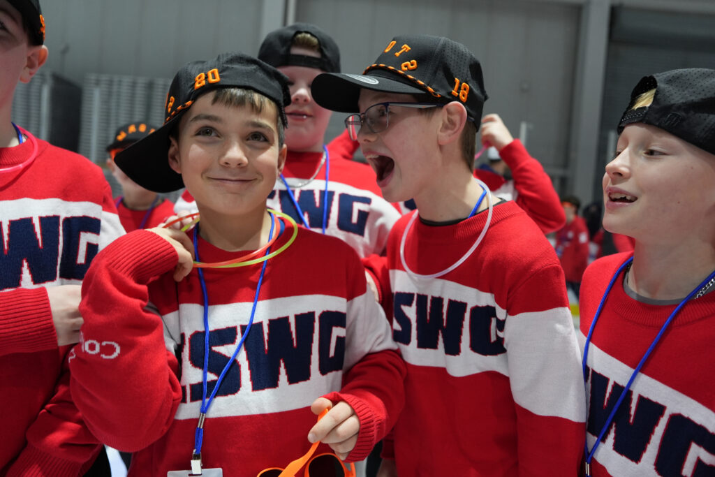 A group of athletes competing in athletic event sports