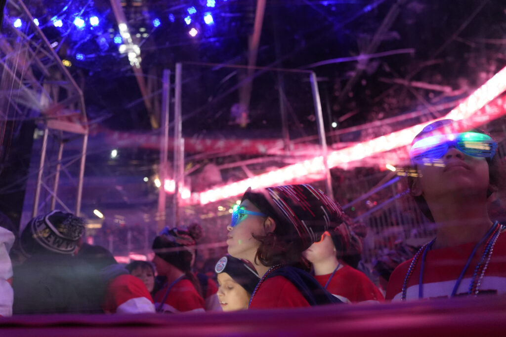 A group of athletes competing in athletic event sports