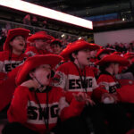 A group of athletes competing in athletic event sports