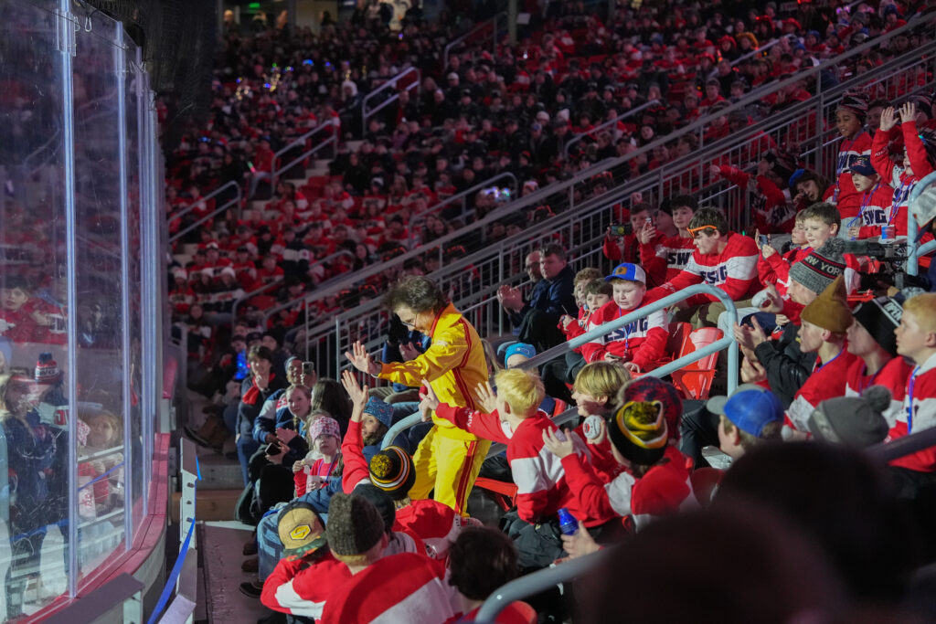 A group of athletes competing in athletic event sports