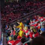 A group of athletes competing in athletic event sports