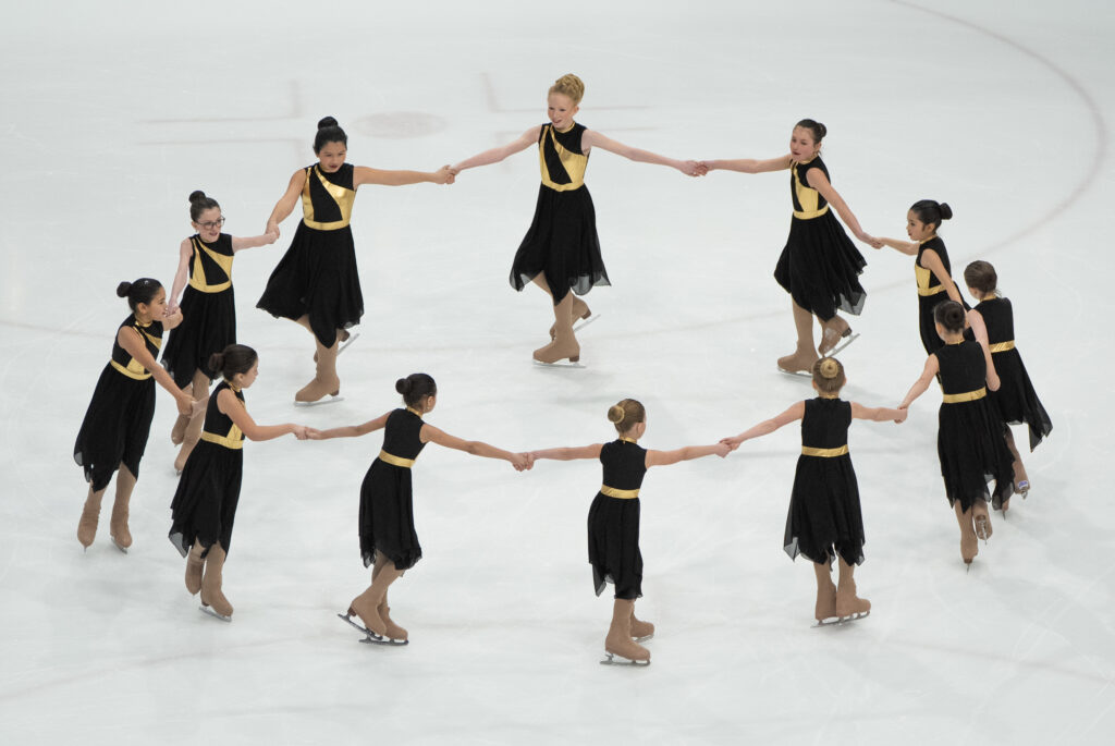 A group of athletes competing in athletic event sports