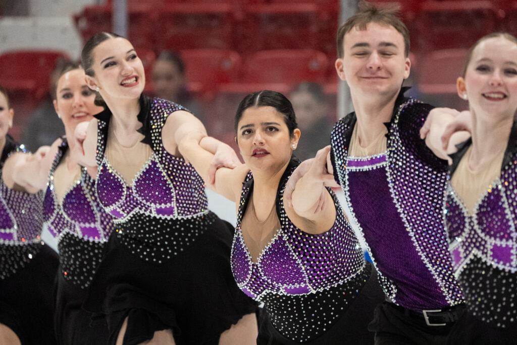 A group of athletes competing in athletic event sports
