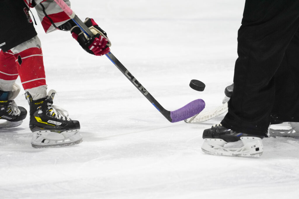 An athlete skating on the rink