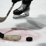 An athlete skating on the rink