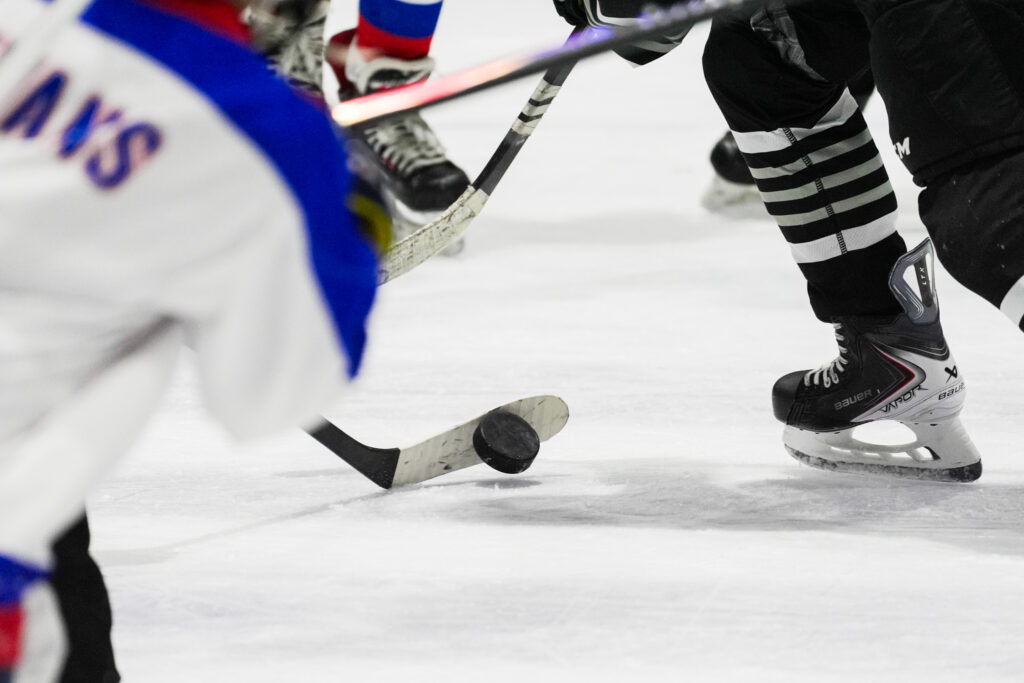 An athlete skating on the rink
