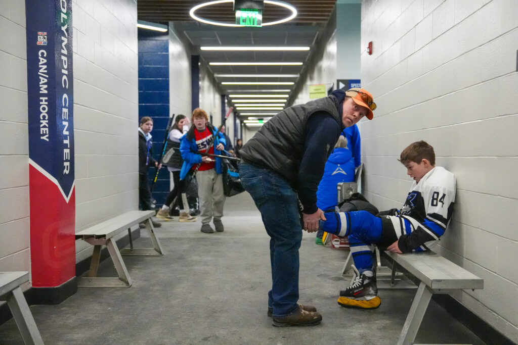 A group of athletes competing in athletic event sports