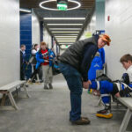 A group of athletes competing in athletic event sports