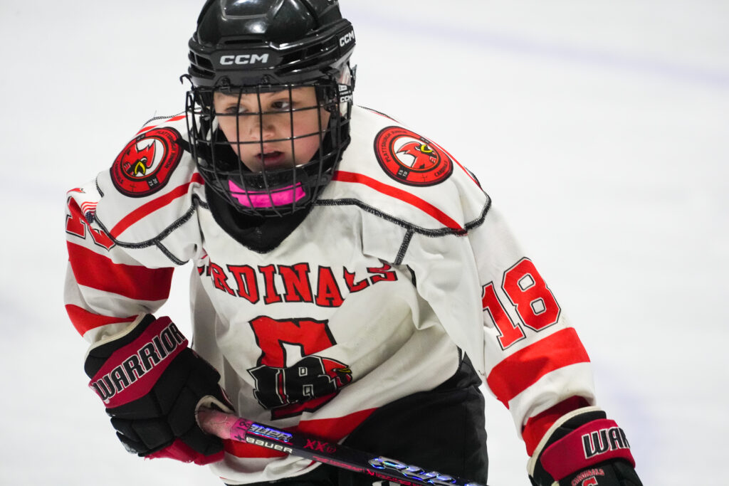 An athlete competing in athletic event sports with helmet