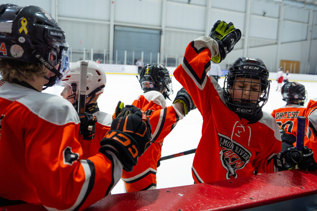 A group of athletes competing in athletic event sports with helmet