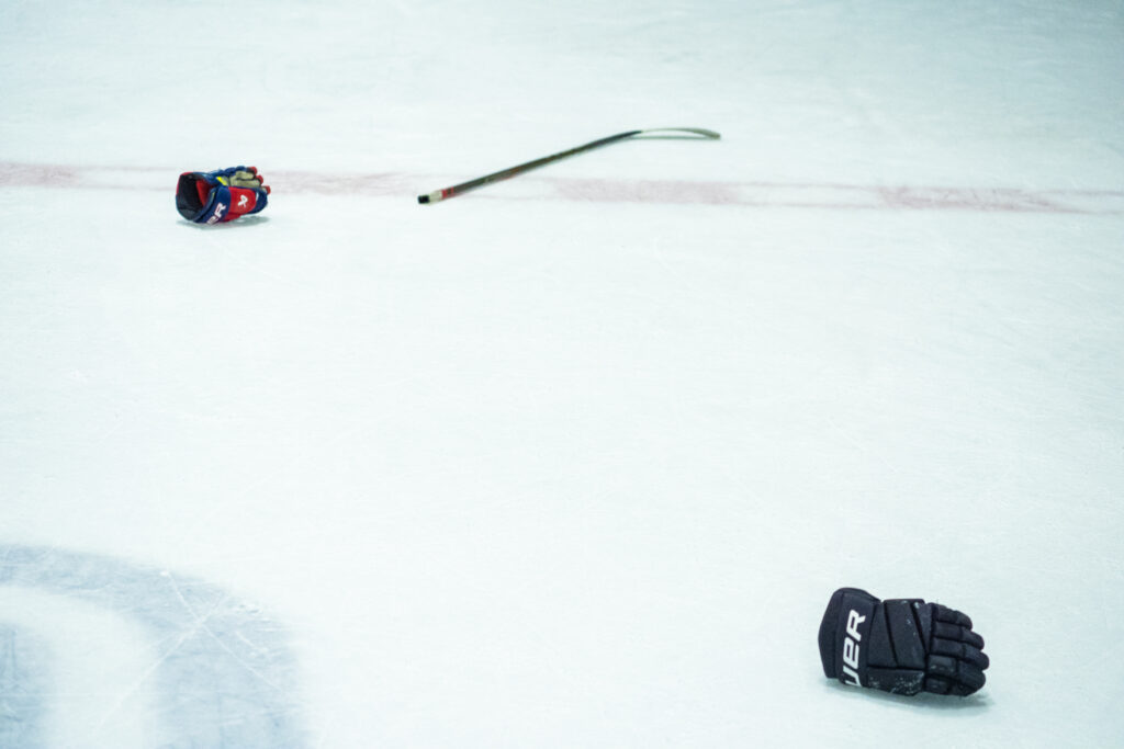 Athletes playing baseball on the field