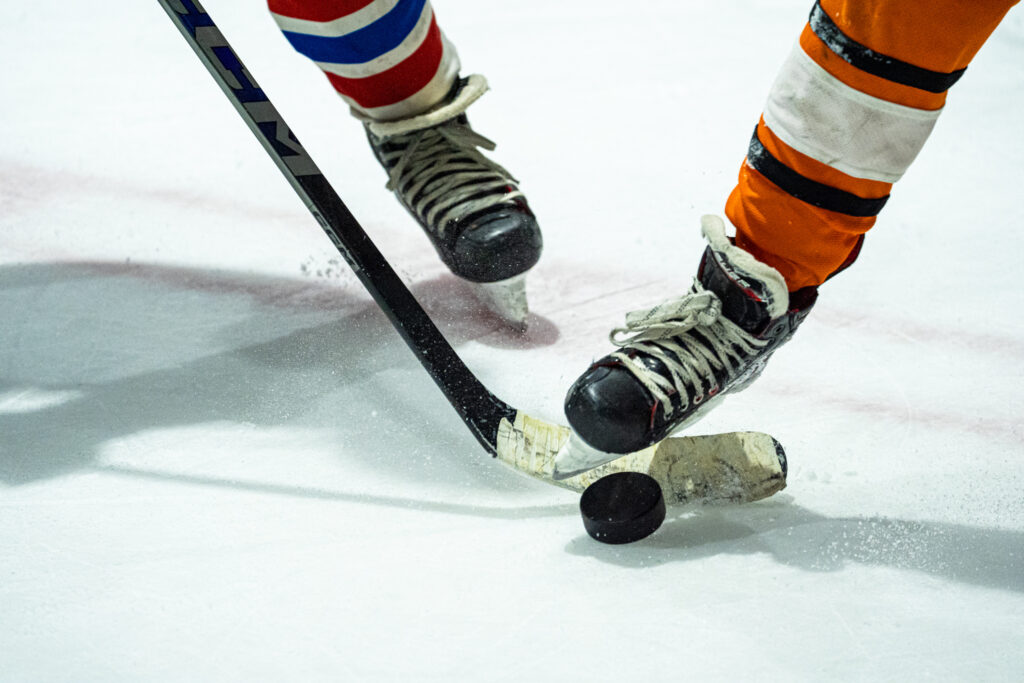 Athletes skating on the rink