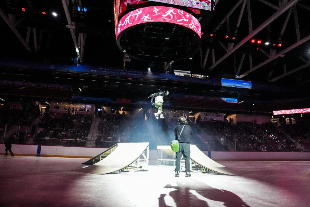 A group of athletes competing in athletic event sports