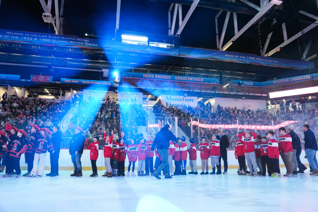 A group of athletes competing in athletic event sports