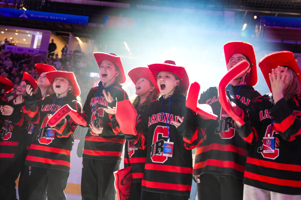 A group of athletes competing in athletic event sports