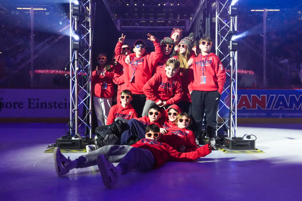 A group of athletes competing in athletic event sports