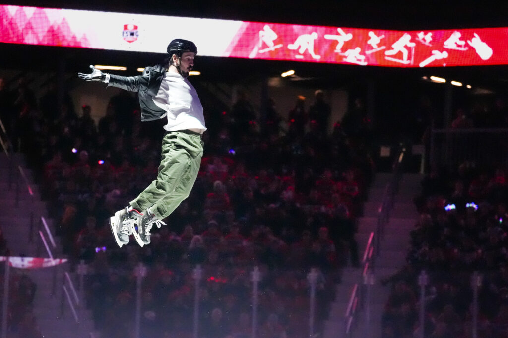 An athlete competing in athletic event sports with helmet