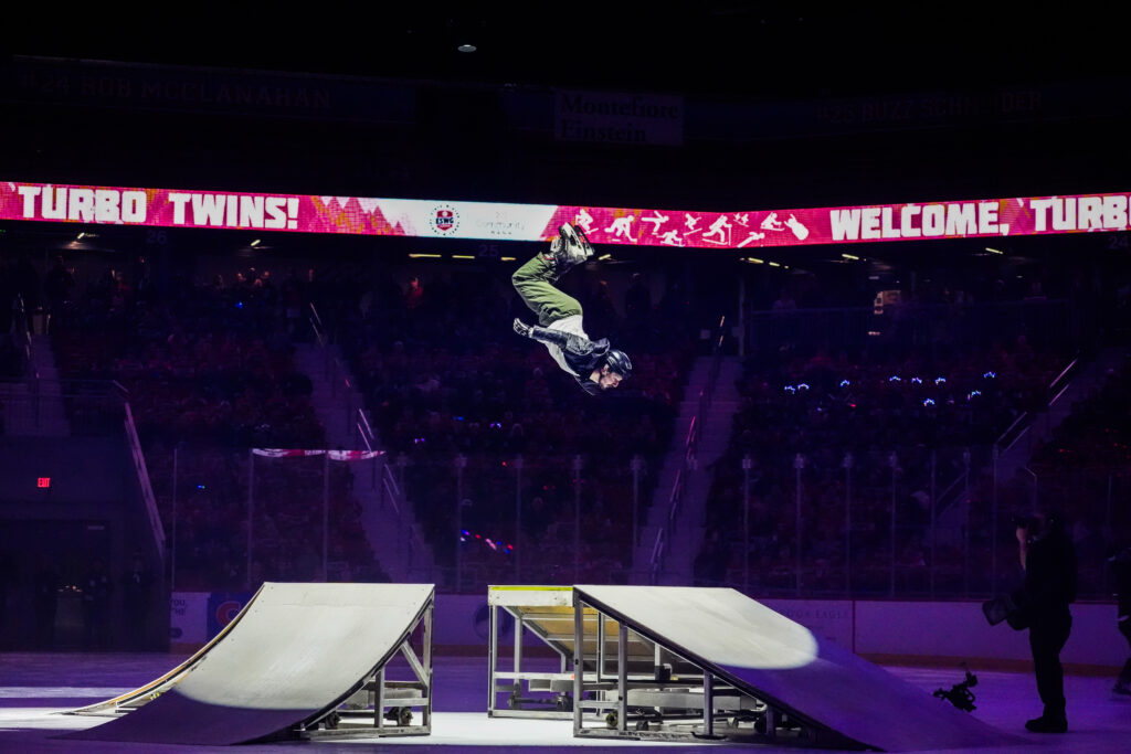 A group of athletes competing in athletic event sports