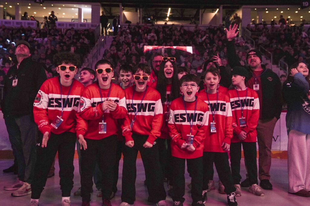 A group of athletes competing in athletic event sports