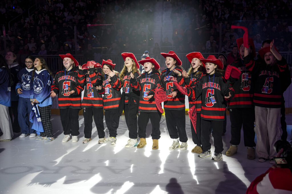 A group of athletes competing in athletic event sports