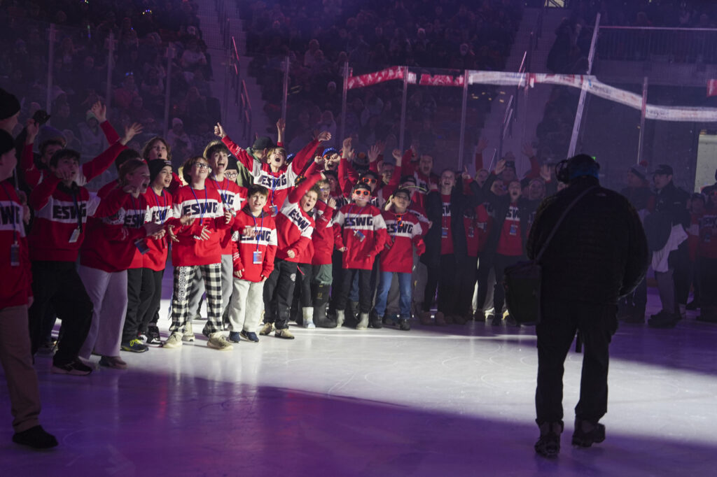 A group of athletes competing in athletic event sports