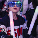 Two athletes competing in athletic event sports