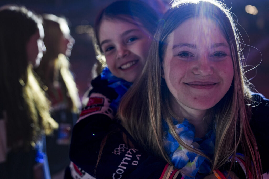 A group of athletes competing in athletic event sports