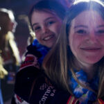 A group of athletes competing in athletic event sports