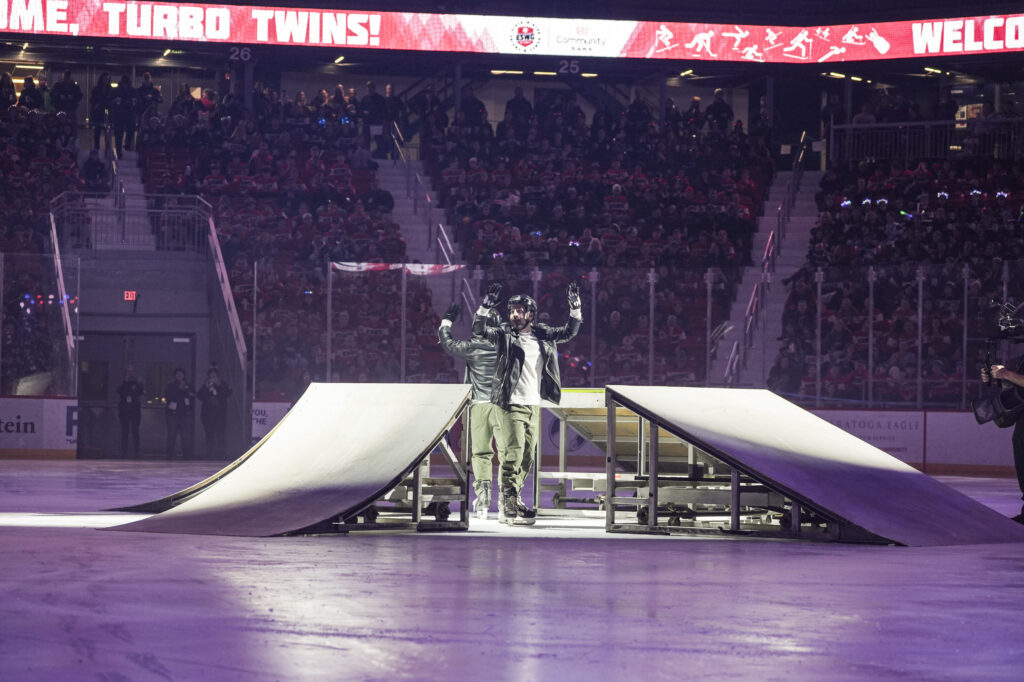 A group of athletes competing in athletic event sports