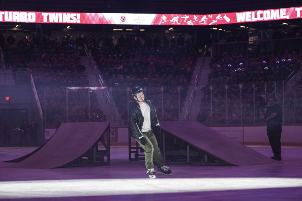 A group of athletes competing in athletic event sports