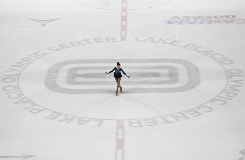 An athlete skating on the rink