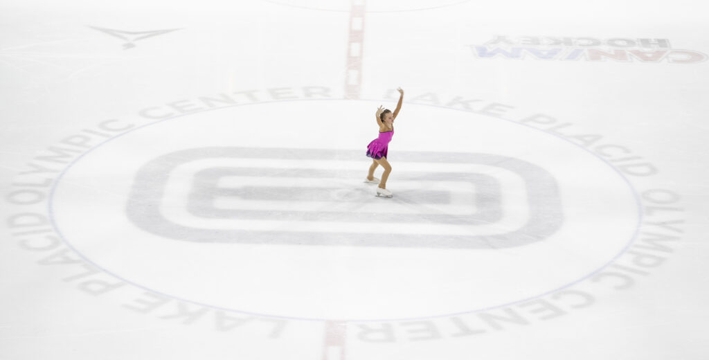 An athlete skating on the rink