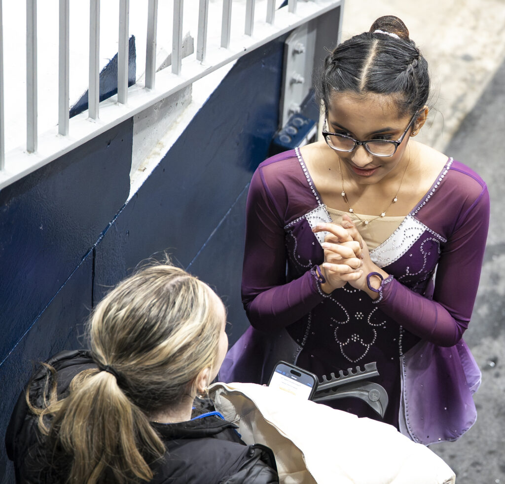 Two athletes competing in athletic event sports