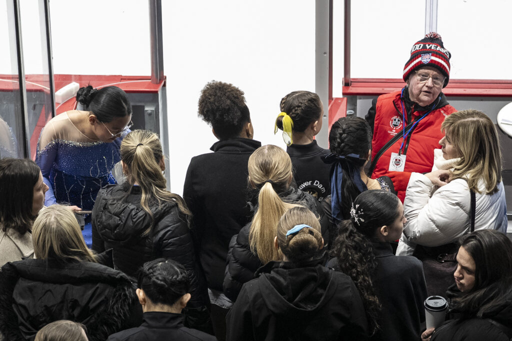 A group of athletes competing in athletic event sports