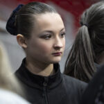 Two athletes competing in athletic event sports