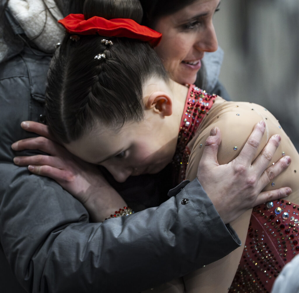 Two athletes competing in athletic event sports