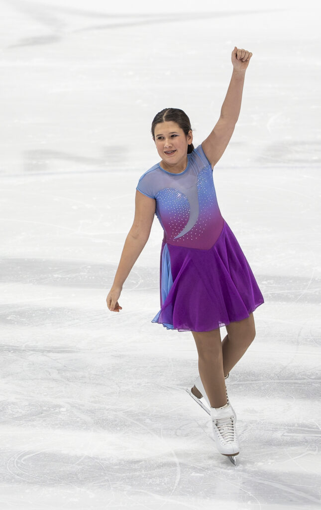 An athlete skating on the rink