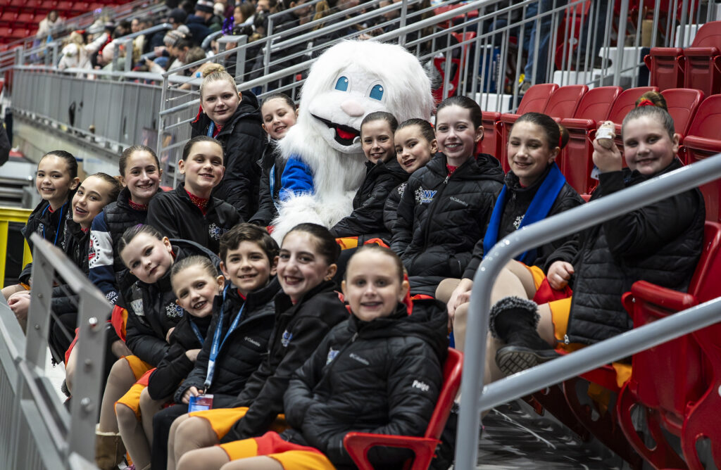 A group of athletes competing in athletic event sports