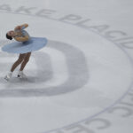 An athlete skating on the rink