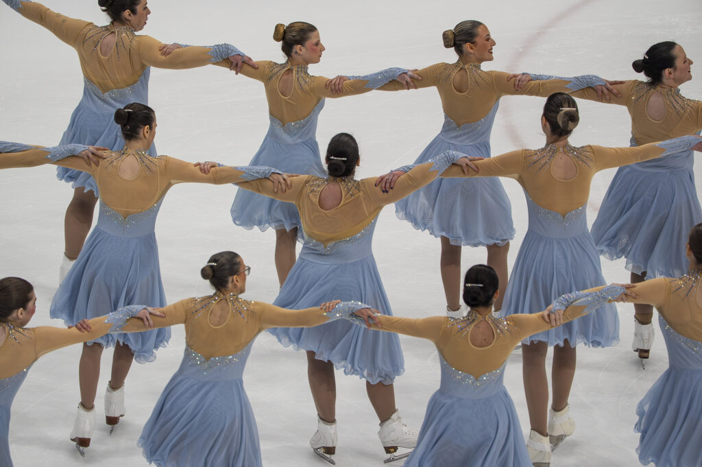 A group of athletes competing in athletic event sports