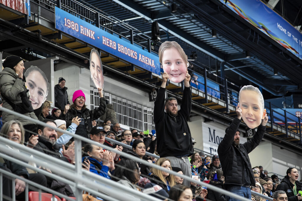 A group of athletes competing in athletic event sports