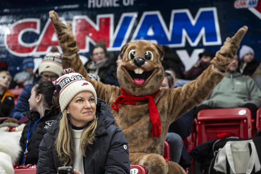 A group of athletes competing in athletic event sports