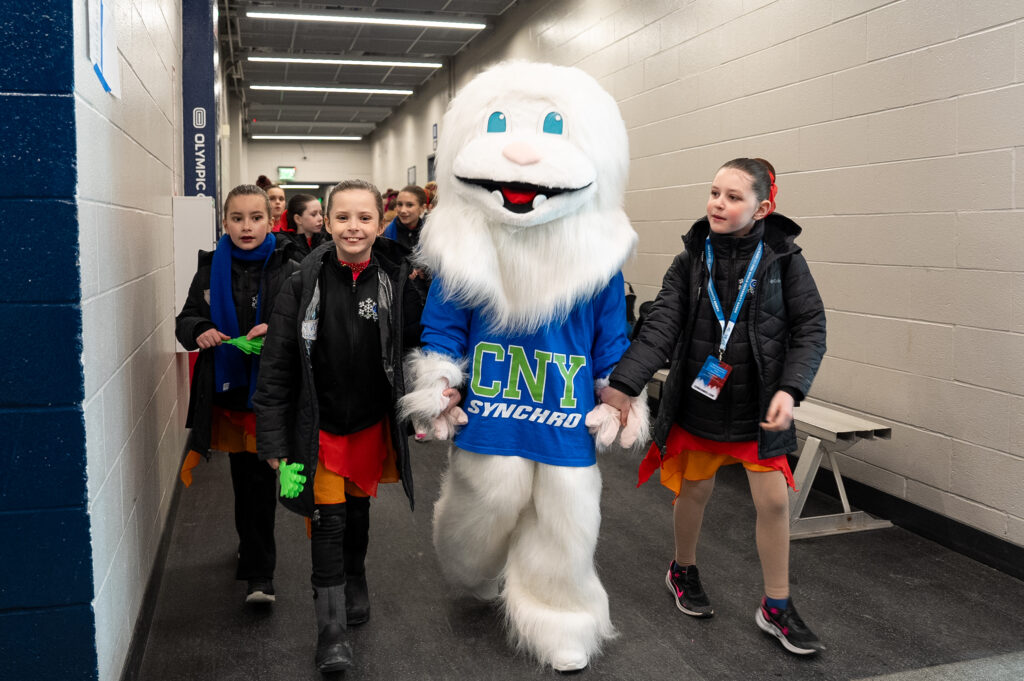 A group of athletes competing in athletic event sports