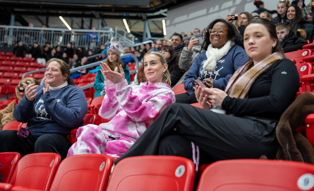 A group of athletes competing in athletic event sports