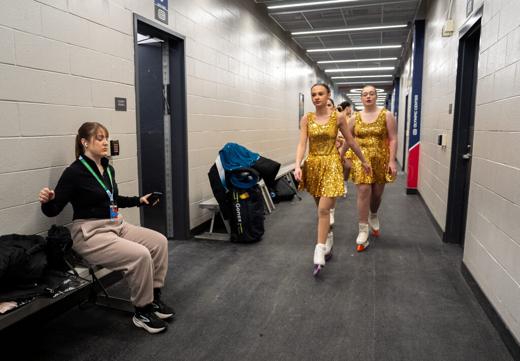 A group of athletes competing in athletic event sports